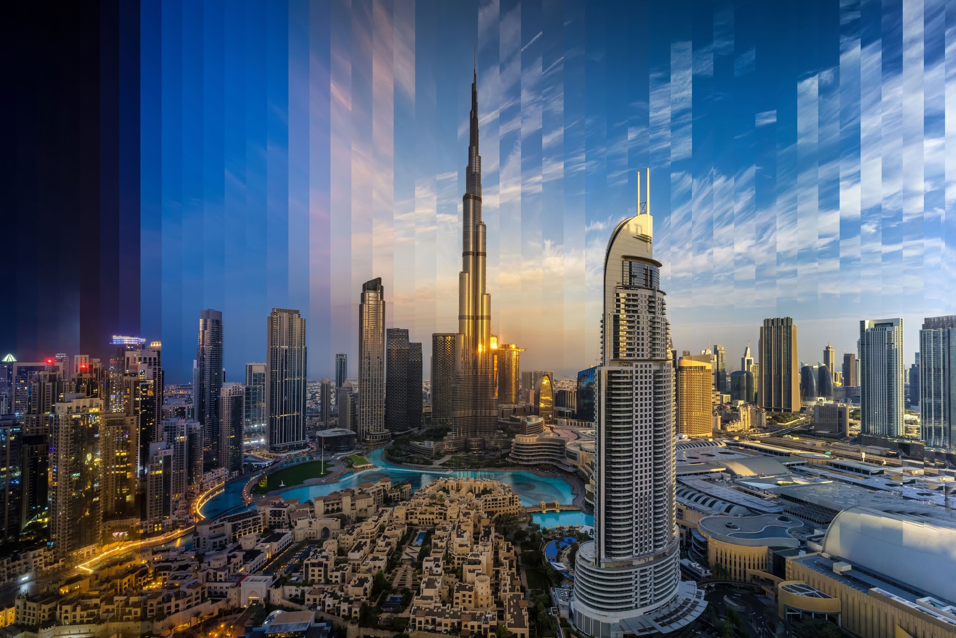Night to day time lapse view of the modern Downtown City skyline of Dubai,